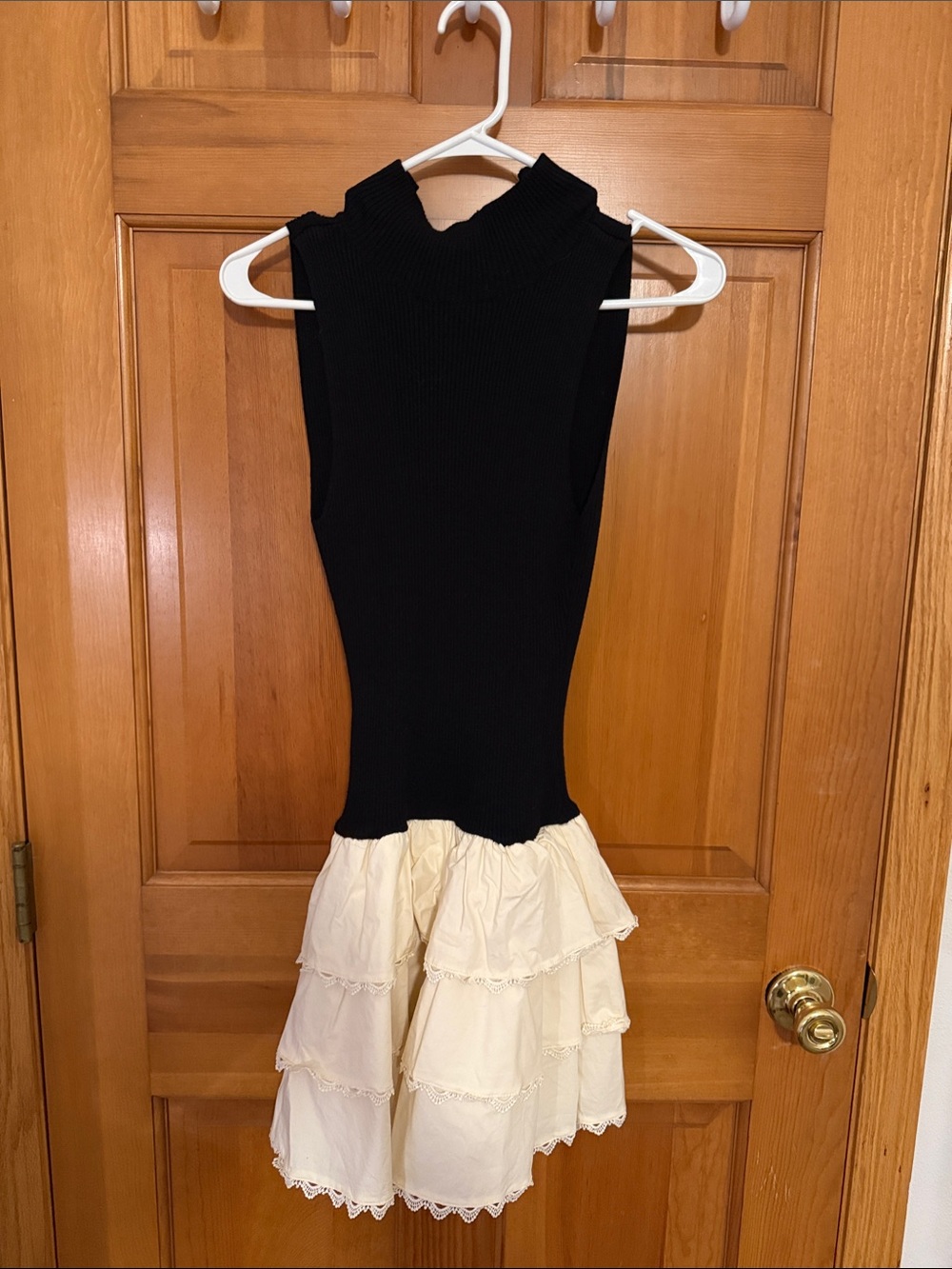 En Saison Sleeveless Black Knit Top with Cream Tiered Skirt